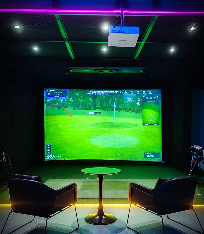 A GolfX launch monitor and simulator screen